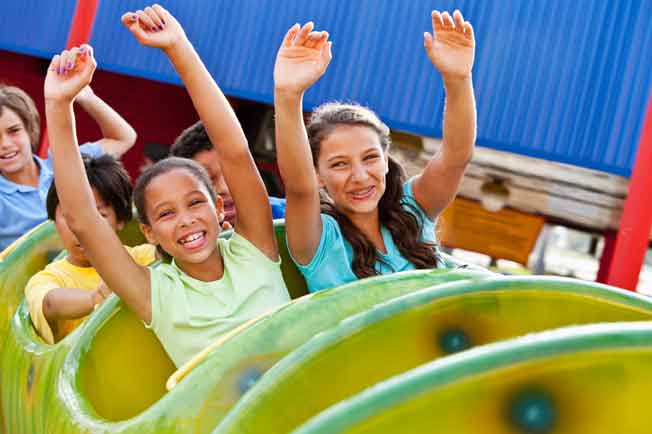 Children on a roller coaster