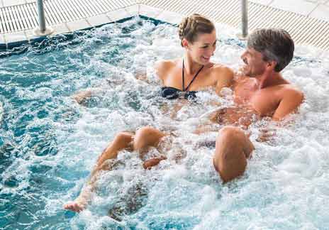 Couple relaxing in a thermal spa